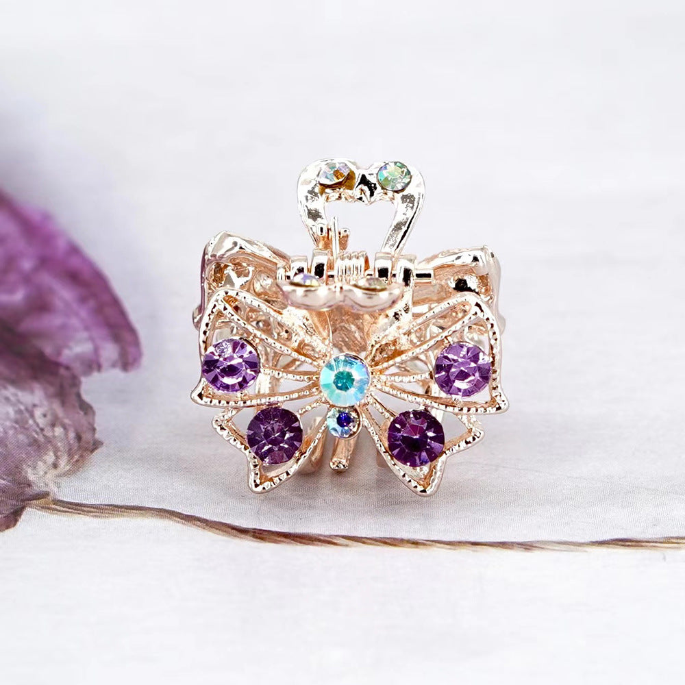 Venta al por mayor Pinza de pelo de aleación de nudo de lazo de diamante